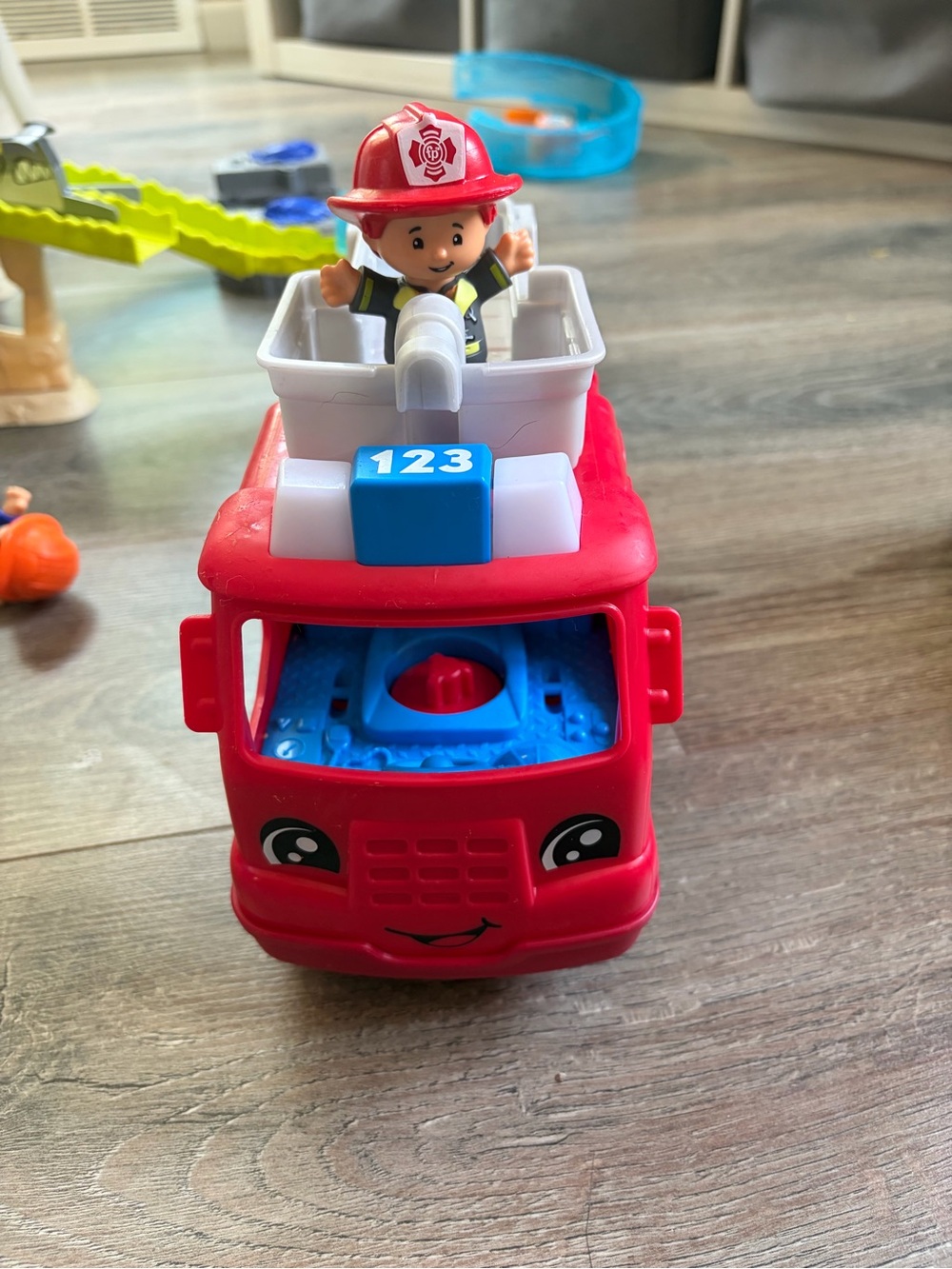 Fisher-Price Red Fire Truck Toy with Firefighter Figure and 123 Block